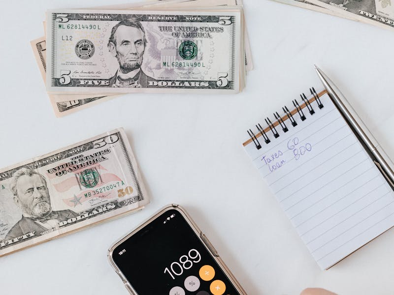 Tax documents and calculator for Finance Bill review